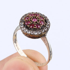 Delicate Ring with little Rubies and White topaz in Silver, with bronze detail